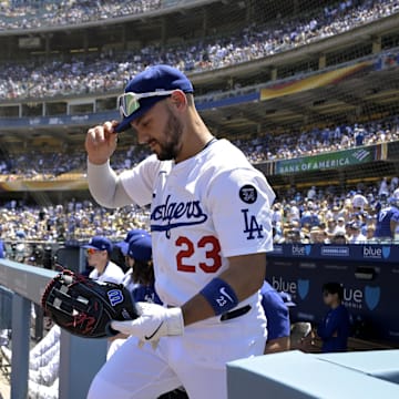 Jul 6, 2025; Los Angeles, California, USA;  Los Angeles Dodgers left fielder Michael Conforto (23) enters the field for the fourth inning against the Houston Astros at Dodger Stadium. Mandatory Credit: Jayne Kamin-Oncea-Imagn Images