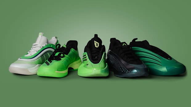 Five green adidas sneakers.
