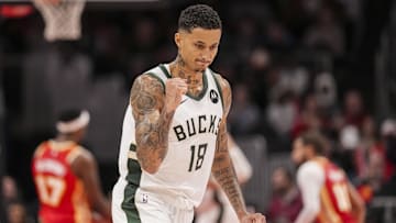 Milwaukee Bucks forward Kyle Kuzma reacts after making a three point basket against the Atlanta Hawks during the second half at State Farm Arena on March 4.