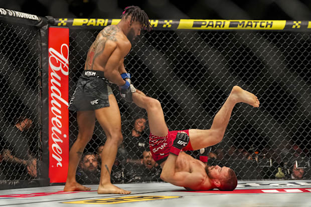 Nathaniel Wood (red gloves) fights against Morgan Charriere (blue gloves) during UFC Fight Night at O2 Arena. 