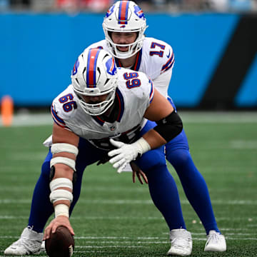 Oct 26, 2025; Charlotte, North Carolina, USA; Buffalo Bills guard Connor McGovern (66) prepares to hike the ball to quarterback Josh Allen (17) 