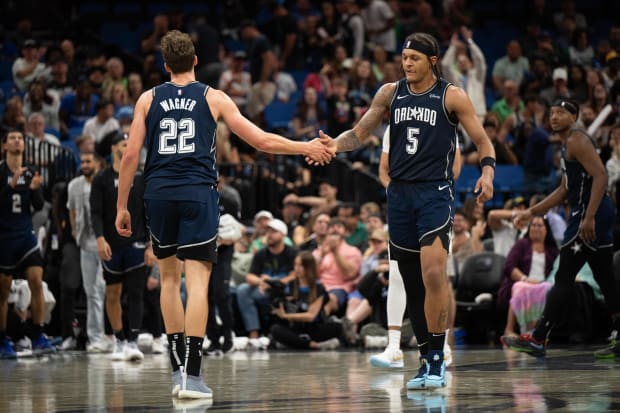 Orlando Magic forward Paolo Banchero (5) celebrates with Orlando Magic forward Franz Wagner (22).