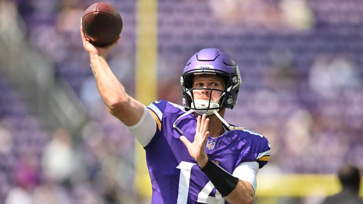 Aug 10, 2024; Minneapolis, Minnesota, USA; Minnesota Vikings quarterback Sam Darnold (14) warms up before the game against the Las Vegas Raiders at U.S. Bank Stadium. Mandatory Credit: Jeffrey Becker-USA TODAY Sports