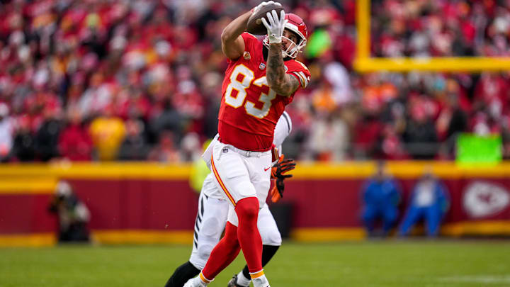 Kansas City Chiefs tight end Noah Gray (83) catches a pass in the first quarter of the NFL Week 17 game between the Kansas City Chiefs and the Cincinnati Bengals at Arrowhead Stadium in Kansas City, Mo., on Sunday, Dec. 31, 2023.