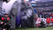 Jan 28, 2024; Baltimore, Maryland, USA; Baltimore Ravens quarterback Lamar Jackson (8) runs onto the