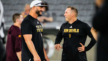 Sep 13, 2025; Tempe, Arizona, USA; Texas State Bobcats head coach G. J. Kinne and Arizona State Sun Devils head coach Kenny Dillingham speak before the game between Arizona State Sun Devils and Texas State Bobcats. Mandatory Credit: Arianna Grainey-Imagn Images