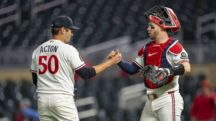 Apr 13, 2026; Minneapolis, Minnesota, USA; Minnesota Twins relief pitcher Garrett Acton (50) celebrates with Minnesota Twins catcher Ryan Jeffers (27) after defeating the Boston Red Sox at Target Field. Mandatory Credit: Jesse Johnson-Imagn Images