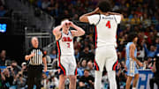Mar 21, 2025; Milwaukee, WI, USA; Mississippi Rebels guard Sean Pedulla (3) and forward Jaemyn Brakefield (4) celebrate after a play during the first half of a first round NCAA men’s tournament game against the North Carolina Tar Heels at Fiserv Forum. Mandatory Credit: Benny Sieu-Imagn Images