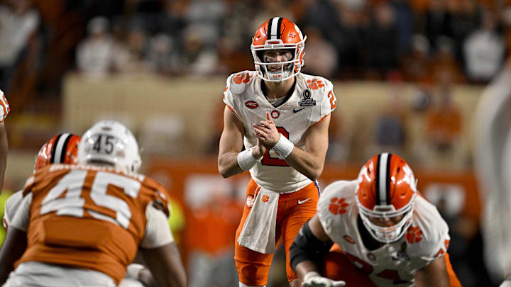 Dec 21, 2024; Austin, Texas, USA; Clemson Tigers quarterback Cade Klubnik (2) in action during the game between the Texas Longhorns and the Clemson Tigers in the CFP National Playoff First Round at Darrell K Royal-Texas Memorial Stadium. Mandatory Credit: Jerome Miron-Imagn Images