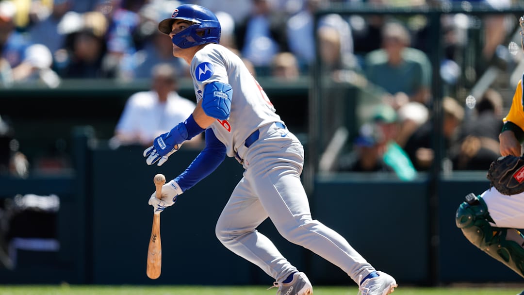 Apr 2, 2025; West Sacramento, California, USA; Chicago Cubs second base Matt Shaw (6) hits an rbi single during the third inning against the Athletics at Sutter Health Park. 