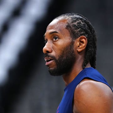 May 3, 2025; Denver, Colorado, USA; LA Clippers forward Kawhi Leonard (2) warms up before the game against the Denver Nuggets during game seven of first round for the 2025 NBA Playoffs at Ball Arena. Mandatory Credit: Ron Chenoy-Imagn Images