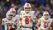 Nov 1, 2025; Lawrence, Kansas, USA; Oklahoma State Cowboys quarterback Zane Flores (6) takes the field during the first half against the Kansas Jayhawks at David Booth Kansas Memorial Stadium. Mandatory Credit: Jay Biggerstaff-Imagn Images