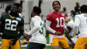 Packers quarterback Jordan Love (10) works out at the team’s minicamp in June.