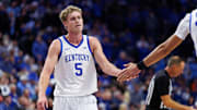 Dec 2, 2025; Lexington, Kentucky, USA; Kentucky Wildcats guard Collin Chandler (5) fives center Malachi Moreno during the first half against the North Carolina Tar Heels at Rupp Arena at Central Bank Center. Mandatory Credit: Jordan Prather-Imagn Images