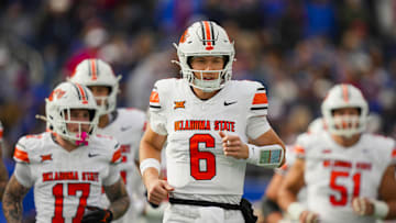 Nov 1, 2025; Lawrence, Kansas, USA; Oklahoma State Cowboys quarterback Zane Flores (6) takes the field during the first half against the Kansas Jayhawks at David Booth Kansas Memorial Stadium. Mandatory Credit: Jay Biggerstaff-Imagn Images