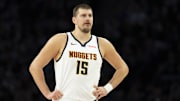Nov 15, 2025; Minneapolis, Minnesota, USA; Denver Nuggets center Nikola Jokic (15) looks on against the Minnesota Timberwolves in the second half at Target Center. Mandatory Credit: Jesse Johnson-Imagn Images