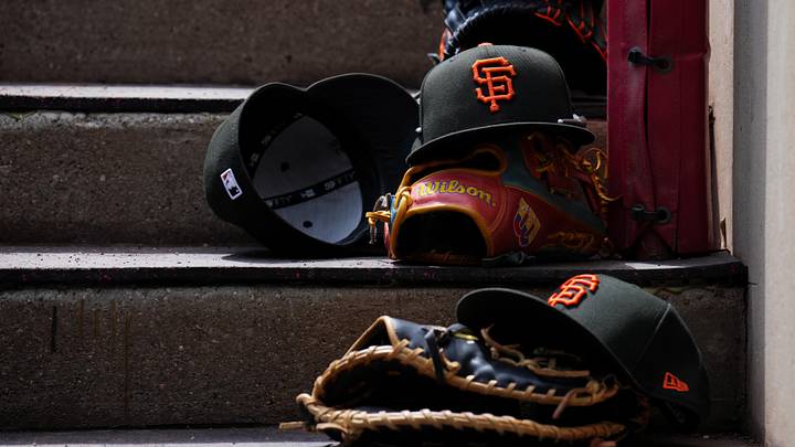 Apr 16, 2026; Cincinnati, Ohio, USA; A view of San Francisco Giants game hats on the dugout steps during the game against the Cincinnati Reds at Great American Ball Park. Mandatory Credit: Aaron Doster-Imagn Images