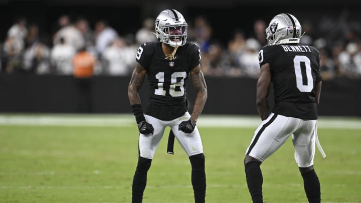 Aug 17, 2024; Paradise, Nevada, USA; Las Vegas Raiders cornerback Jack Jones (18) and cornerback Jakorian Bennett (0) celebrate a play against the Dallas Cowboys in the first quarter at Allegiant Stadium. Mandatory Credit: Candice Ward-USA TODAY Sports