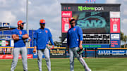 Feb 19, 2025; Port St. Lucie, FL, USA; New York Mets right fielder Juan Soto (right) talks to center fielder Jose Siri (center) and right fielder Starling Marte (left) during a spring training workout at Clover Park. Mandatory Credit: Sam Navarro-Imagn Images