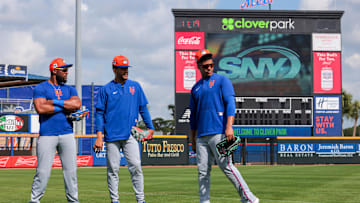 Feb 19, 2025; Port St. Lucie, FL, USA; New York Mets right fielder Juan Soto (right) talks to center fielder Jose Siri (center) and right fielder Starling Marte (left) during a spring training workout at Clover Park. Mandatory Credit: Sam Navarro-Imagn Images
