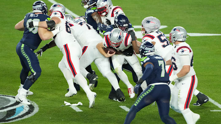 Feb 8, 2026; Santa Clara, CA, USA; New England Patriots quarterback Drake Maye (10) is sacked by Seattle Seahawks defensive tackle Byron Murphy II (91) in the second half in Super Bowl LX at Levi's Stadium. Mandatory Credit: Kirby Lee-Imagn Images
