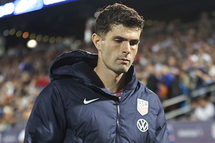 Christian Pulisic on the touchline after being taken off injured in USMNT’s game with Australia.
