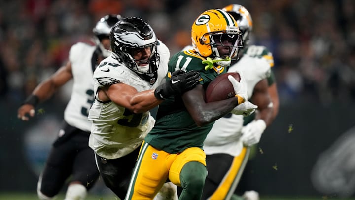 Sep 6, 2024; Sao Paulo, BRA; Green Bay Packers wide receiver Jayden Reed (11) runs against Philadelphia Eagles linebacker Zack Baun (53) during the first half at Neo Quimica Arena. Mandatory Credit: Kirby Lee-Imagn Images