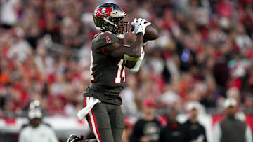 Tampa Bay Buccaneers wide receiver Chris Godwin (14) catches a pass in the second quarter during a Week 15 NFL game against the Cincinnati Bengals, Sunday, Dec. 18, 2022, at Raymond James Stadium in Tampa, Fla.

Nfl Cincinnati Bengals At Tampa Bay Buccaneers Dec 18 2090