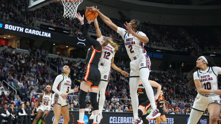 South Carolina basketball forward Ashlyn Watkins "stealing" a block opportunity from guard MiLaysia Fulwiley in the Gamecocks' win over the Oregon State Beavers