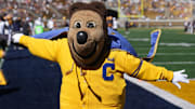 Oct 19, 2024; Berkeley, California, USA; California Golden Bears mascot Oski stands on the sideline before the game against the North Carolina State Wolfpack at California Memorial Stadium. Mandatory Credit: Darren Yamashita-Imagn Images
