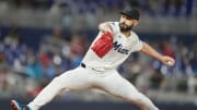 Jul 23, 2024; Miami, Florida, USA;  Miami Marlins pitcher Tanner Scott (66) pitches in the ninth inning against the Baltimore Orioles at loanDepot Park.