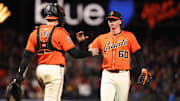 May 2, 2025; San Francisco, California, USA; San Francisco Giants catcher Sam Huff (23) celebrates with starting pitcher Hayden Birdsong (60) after the game against the Colorado Rockies at Oracle Park