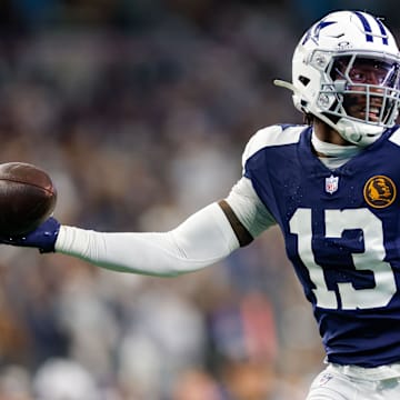 Dallas Cowboys linebacker DeMarvion Overshown intercepts a pass and returns it for a touchdown against the New York Giants