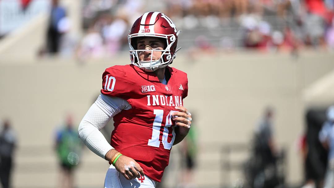 Sep 5, 2026; Bloomington, Indiana, USA; Indiana Hoosiers quarterback Josh Hoover (10) runs onto the field during the fourth quarter against the North Texas Mean Green at Merchants Bank Field at Memorial Stadium. Mandatory Credit: Robert Goddin-Imagn Images Sep 5, 2026; Bloomington, Indiana, USA; Indiana Hoosiers quarterback Josh Hoover (10) runs onto the field during the fourth quarter against the North Texas Mean Green at Merchants Bank Field at Memorial Stadium. Mandatory Credit: Robert Goddin-Imagn Images