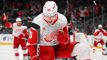 Feb 4, 2025; Seattle, Washington, USA; Detroit Red Wings left wing Elmer Soderblom (85) celebrates after scoring a goal against the Seattle Kraken during the third period at Climate Pledge Arena. Mandatory Credit: Steven Bisig-Imagn Images