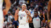 Denver Nuggets forward Gordon celebrates a three-pointer.