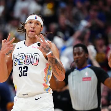Denver Nuggets forward Gordon celebrates a three-pointer.
