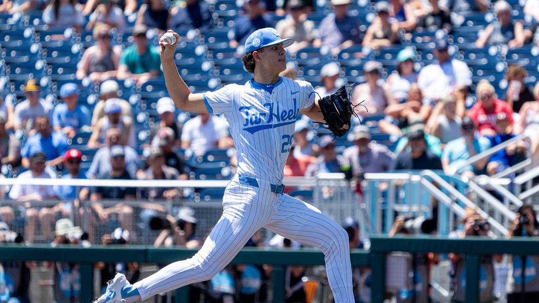 Jun 14, 2024; Omaha, NE, USA; North Carolina Tar Heels starting pitcher Jason DeCaro (29) throws the opening pitch against the Virginia Cavaliers at Charles Schwab Filed Omaha. Mandatory Credit: Dylan Widger-Imagn Images