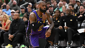 Mar 8, 2025; Boston, Massachusetts, USA; Los Angeles Lakers forward LeBron James (23) reacts after being fouled by Boston Celtics forward Jayson Tatum (not seen) during the fourth quarter at the TD Garden. Mandatory Credit: Brian Fluharty-Imagn Images