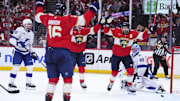 Apr 28, 2025; Sunrise, Florida, USA; Florida Panthers defenseman Aaron Ekblad (5) celebrates with teammates after scoring against the Tampa Bay Lightning during the third period in game four of the first round of the 2025 Stanley Cup Playoffs at Amerant Bank Arena. Mandatory Credit: Rich Storry-Imagn Images