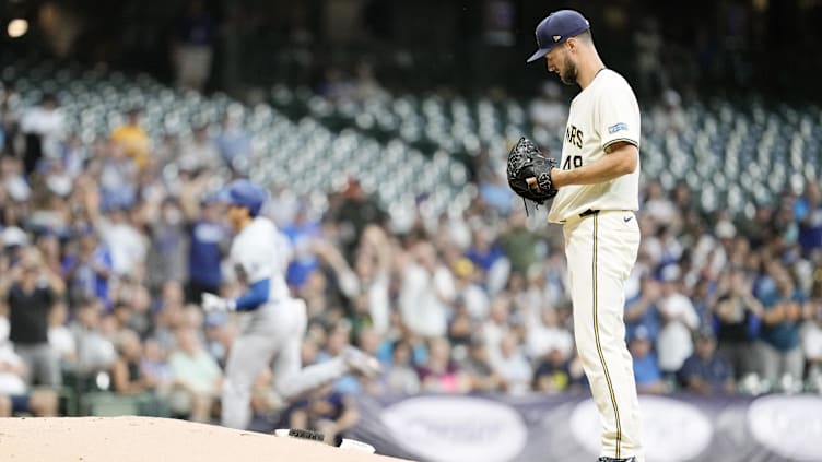 Aug 13, 2024; Milwaukee, Wisconsin, USA;  Milwaukee Brewers pitcher Colin Rea (48) looks on after giving up a home run to Los Angeles Dodgers designated hitter Shohei Ohtani (17) during the third inning at American Family Field. Mandatory Credit: Jeff Hanisch-USA TODAY Sports