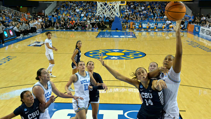 Mar 21, 2026; Los Angeles, CA, USA;  UCLA Bruins forward Sienna Betts (16) shoots over California Baptist Lancers center Emma Johansson (14) in the first half at Pauley Pavilion. Mandatory Credit: Jayne Kamin-Oncea-Imagn Images