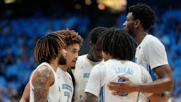 Feb 8, 2025; Chapel Hill, North Carolina, USA;  North Carolina Tar Heels players huddle in the second half at Dean E. Smith Center. Mandatory Credit: Bob Donnan-Imagn Images