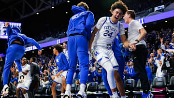 Nov 26, 2025; Lexington, Kentucky, USA; Kentucky Wildcats center Malachi Moreno (24) celebrates after guard Walker Horn makes a basket during the second half against the Tennessee Tech Golden Eagles at Rupp Arena at Central Bank Center. Mandatory Credit: Jordan Prather-Imagn Images