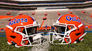 Two helmets rest on Steve Spurrier-Florida Field before the start of the Orange and Blue game at Ben Hill Griffin Stadium in Gainesville, FL on Saturday, April 13, 2024. [Doug Engle/Gainesville Sun]2024