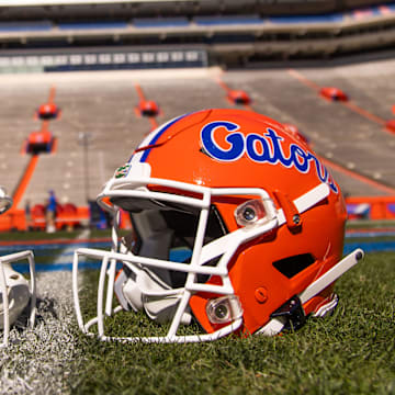 Two helmets rest on Steve Spurrier-Florida Field before the start of the Orange and Blue game at Ben Hill Griffin Stadium in Gainesville, FL on Saturday, April 13, 2024. [Doug Engle/Gainesville Sun]2024