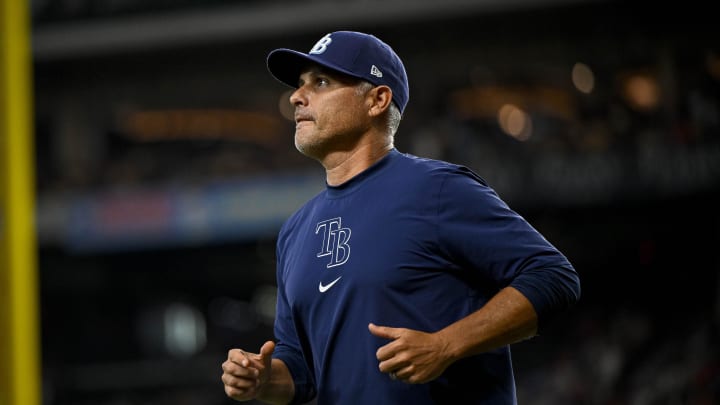 Jul 6, 2024; Arlington, Texas, USA; Tampa Bay Rays manager Kevin Cash (16) runs back to the dugout during the seventh inning against the Texas Rangers at Globe Life Field. Mandatory Credit: Jerome Miron-USA TODAY Sports