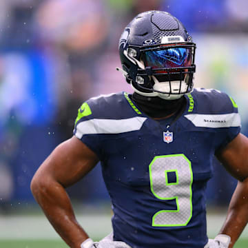 Dec 22, 2024; Seattle, Washington, USA; Seattle Seahawks running back Kenneth Walker III (9) during warmups before the game against the Minnesota Vikings at Lumen Field. Mandatory Credit: Steven Bisig-Imagn Images
