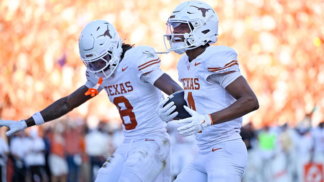 Oct 10, 2026; Dallas, Texas, USA; Texas Longhorns wide receiver Jermaine Bishop Jr. (4) and wide receiver Cam Coleman (8) celebrate after scoring a touchdown against the Oklahoma Sooners during the game between the Sooners and the Longhorns at Cotton Bowl. Mandatory Credit: Jerome Miron-Imagn Images Oct 10, 2026; Dallas, Texas, USA; Texas Longhorns wide receiver Jermaine Bishop Jr. (4) and wide receiver Cam Coleman (8) celebrate after scoring a touchdown against the Oklahoma Sooners during the game between the Sooners and the Longhorns at Cotton Bowl. Mandatory Credit: Jerome Miron-Imagn Images
