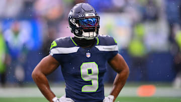 Dec 22, 2024; Seattle, Washington, USA; Seattle Seahawks running back Kenneth Walker III (9) during warmups before the game against the Minnesota Vikings at Lumen Field. Mandatory Credit: Steven Bisig-Imagn Images